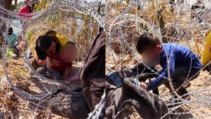 Imágenes de niños arrastrándose en alambres de púas demuestran la gravedad de la crisis migratoria